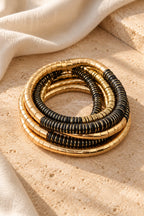 Golden Noir Coil Bracelet Stack stacked