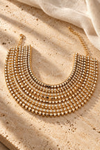 Golden Goddess Rhinestone Collar Necklace on stone