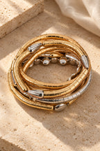 Gold Rush Twist Coil Bangles on stone