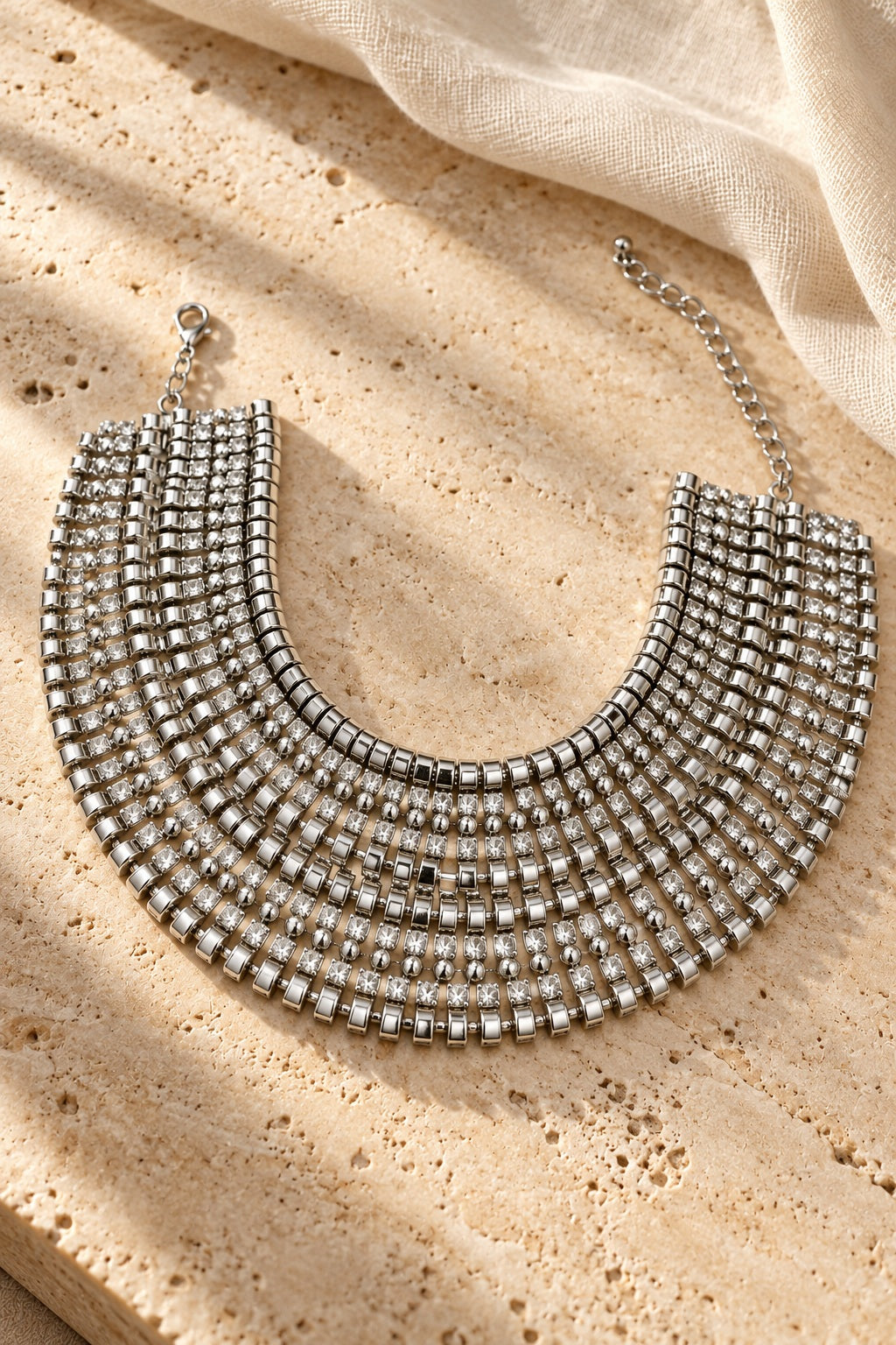 Silver Siren Rhinestone Collar Necklace on stone