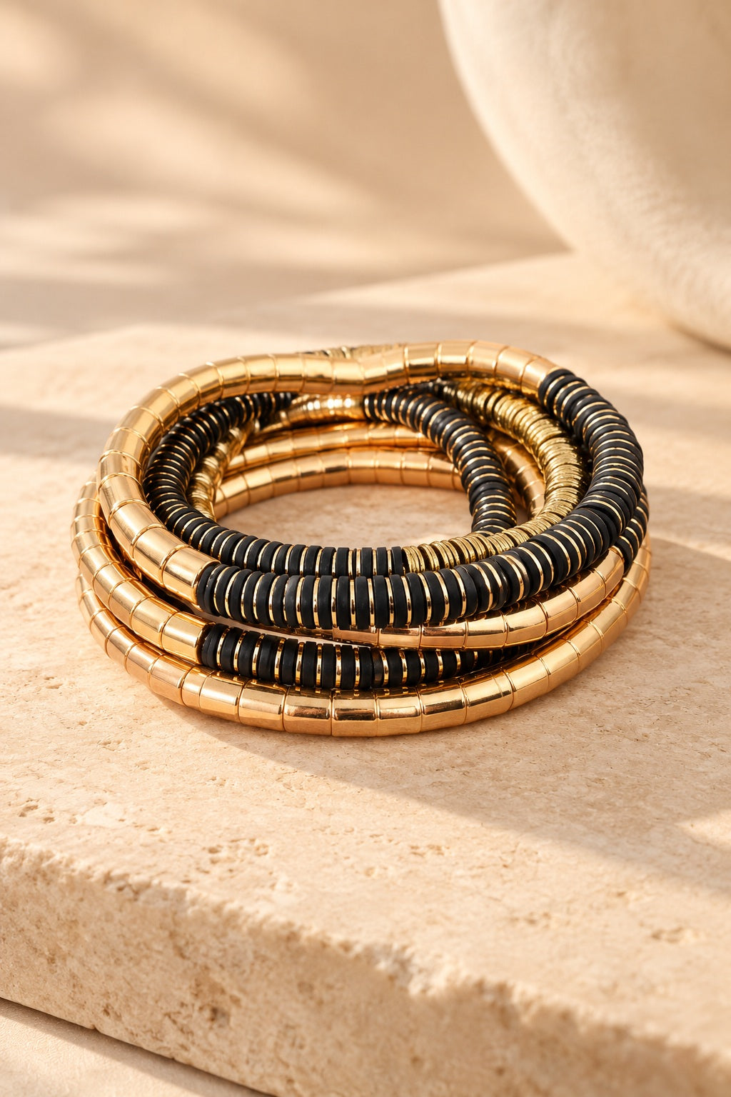 Golden Noir Coil Bracelet Stack stacked, side view