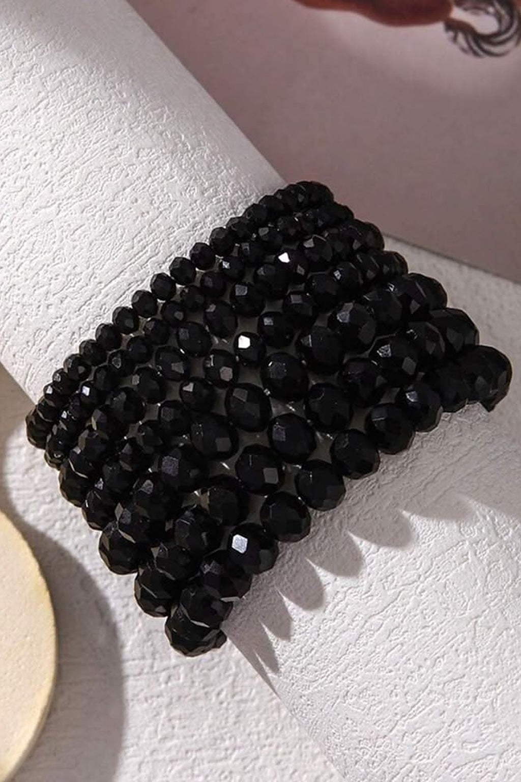 Midnight Sparkle Stretchable Bracelet Set stacked on a stand