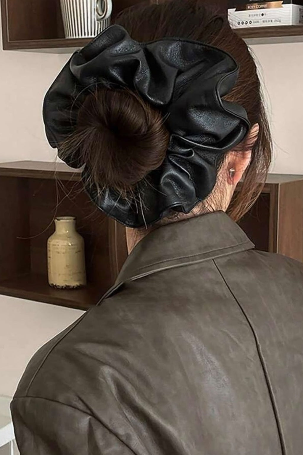 Big Leather Scrunchie - Black worn on a bun