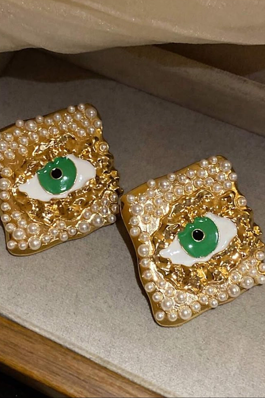 Emerald Gaze Square Stud Earrings pair in a gift box