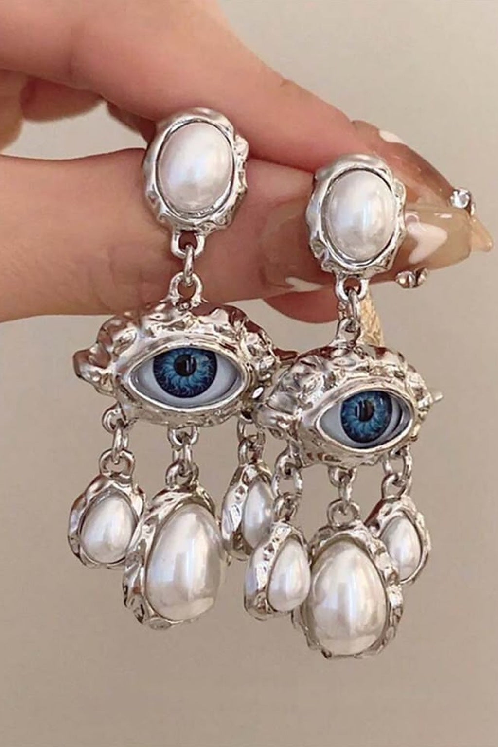 Lucky Lash Pearl Drop Earrings pair close-up