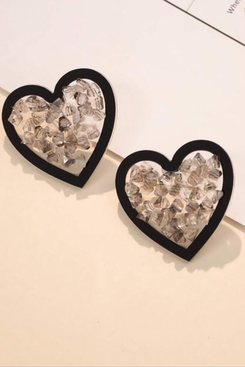 Crystal Crush Heart Earrings pair flat lay