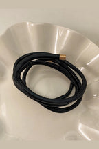 Leather Wrap Ponytail Tie - Black coiled