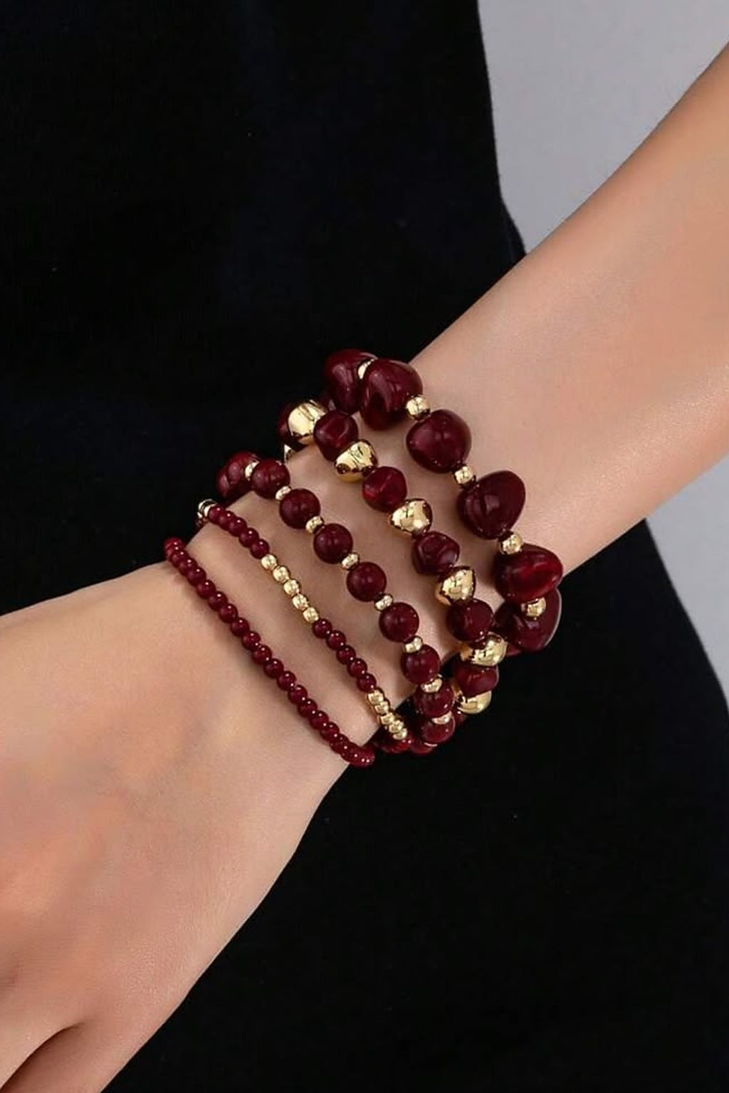 Marble Muse Stretchable Bracelet Stack – Burgundy, worn on the wrist