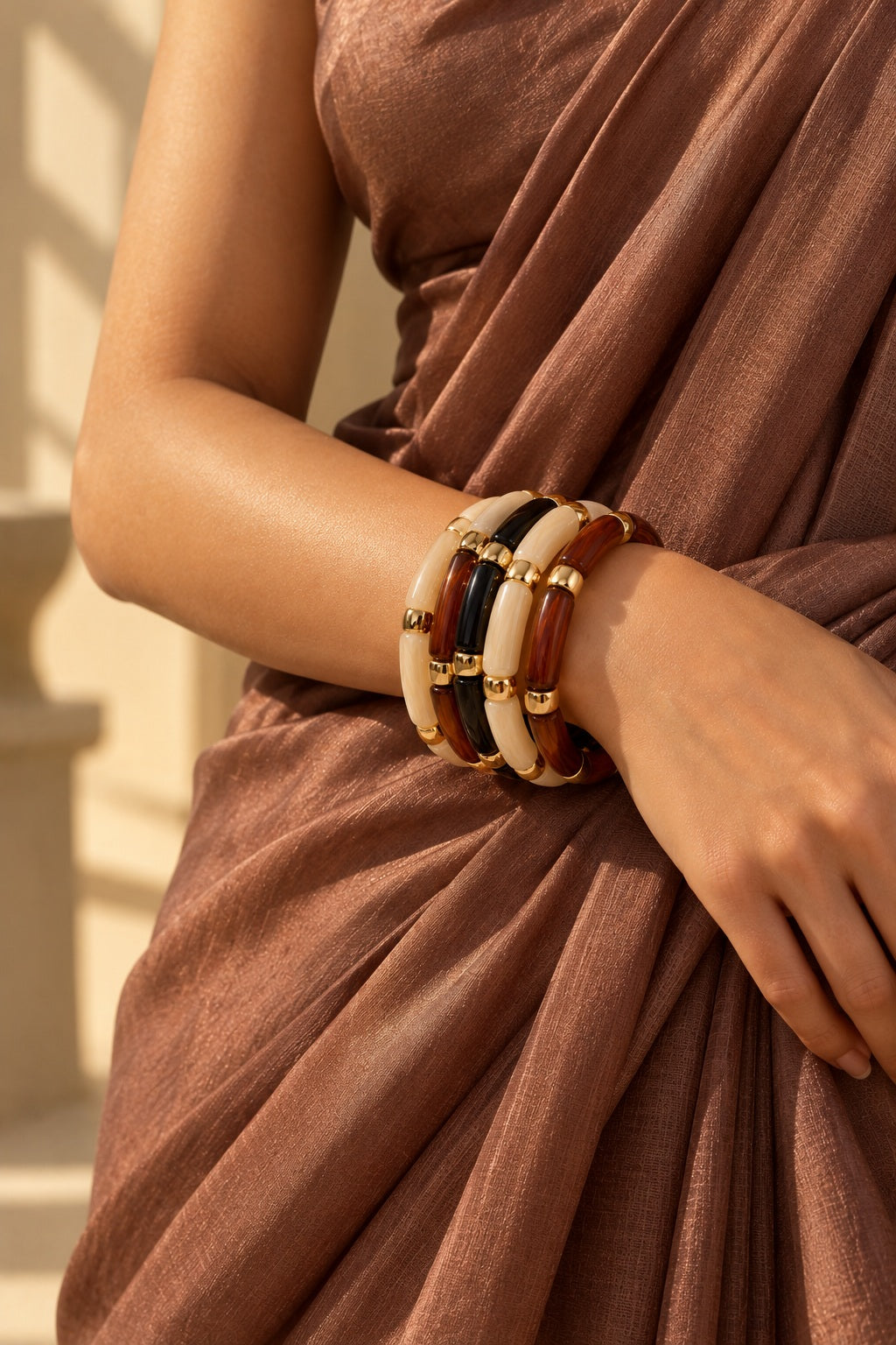 Mocha Noir Tube Bracelet Stack worn with a saree