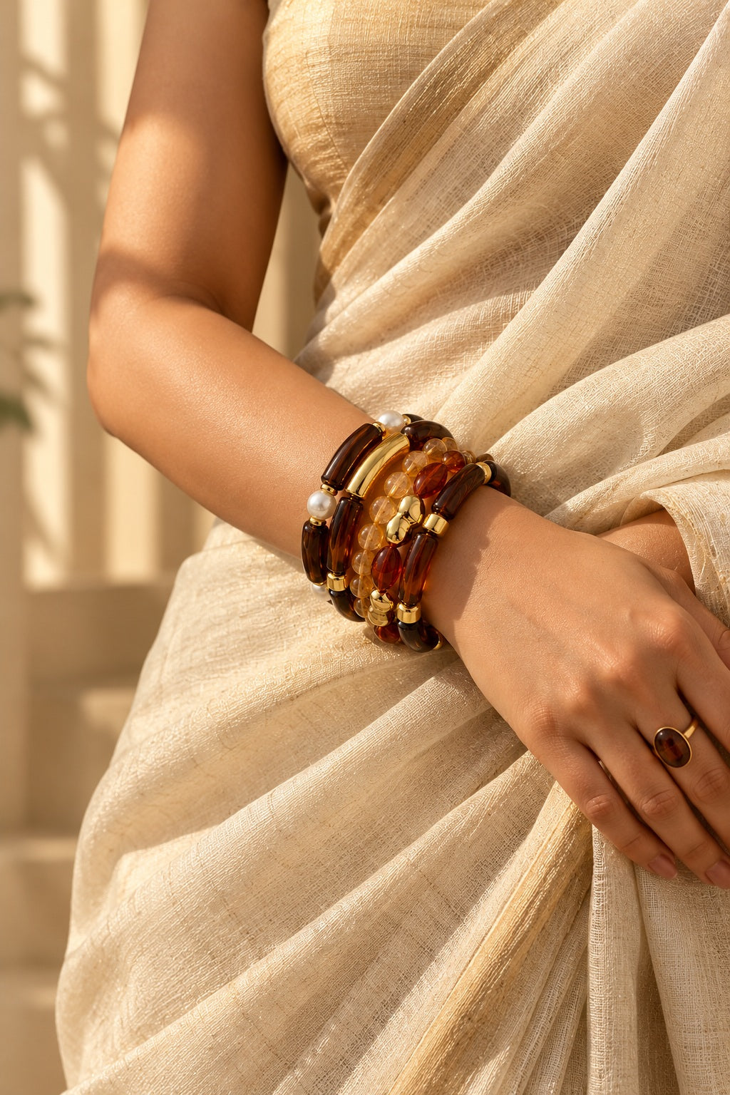 Honey Pearl Amber Bracelet Stack worn with a saree