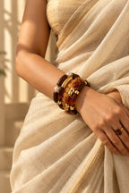 Honey Pearl Amber Bracelet Stack worn with a saree