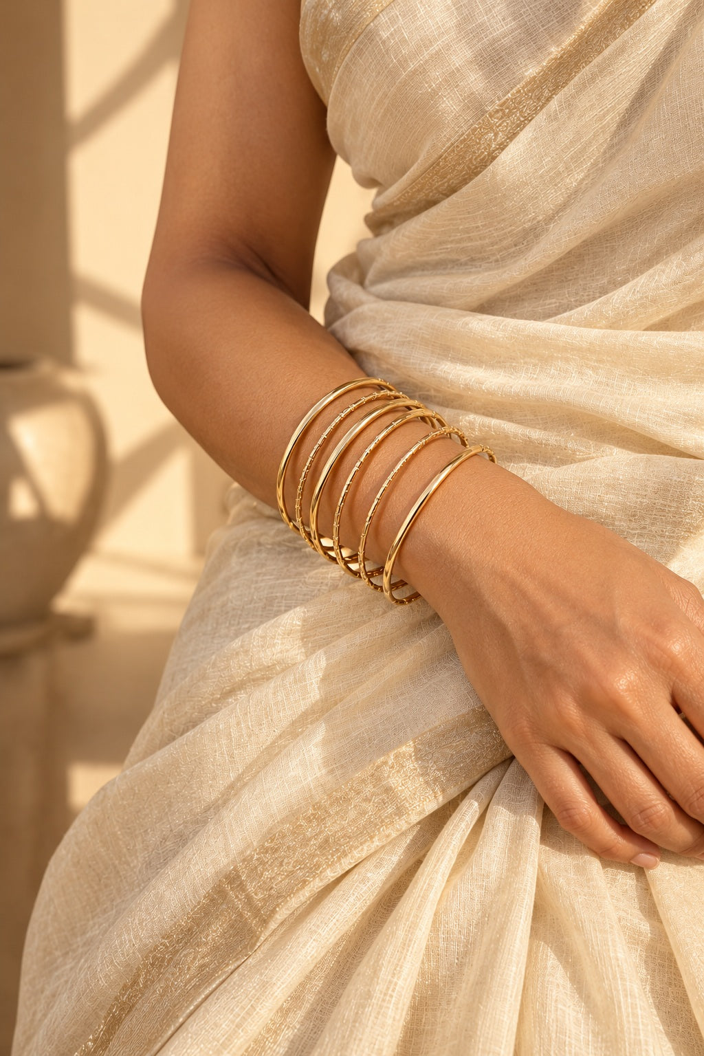 Golden Halo Wire Bangle Stack worn with a saree