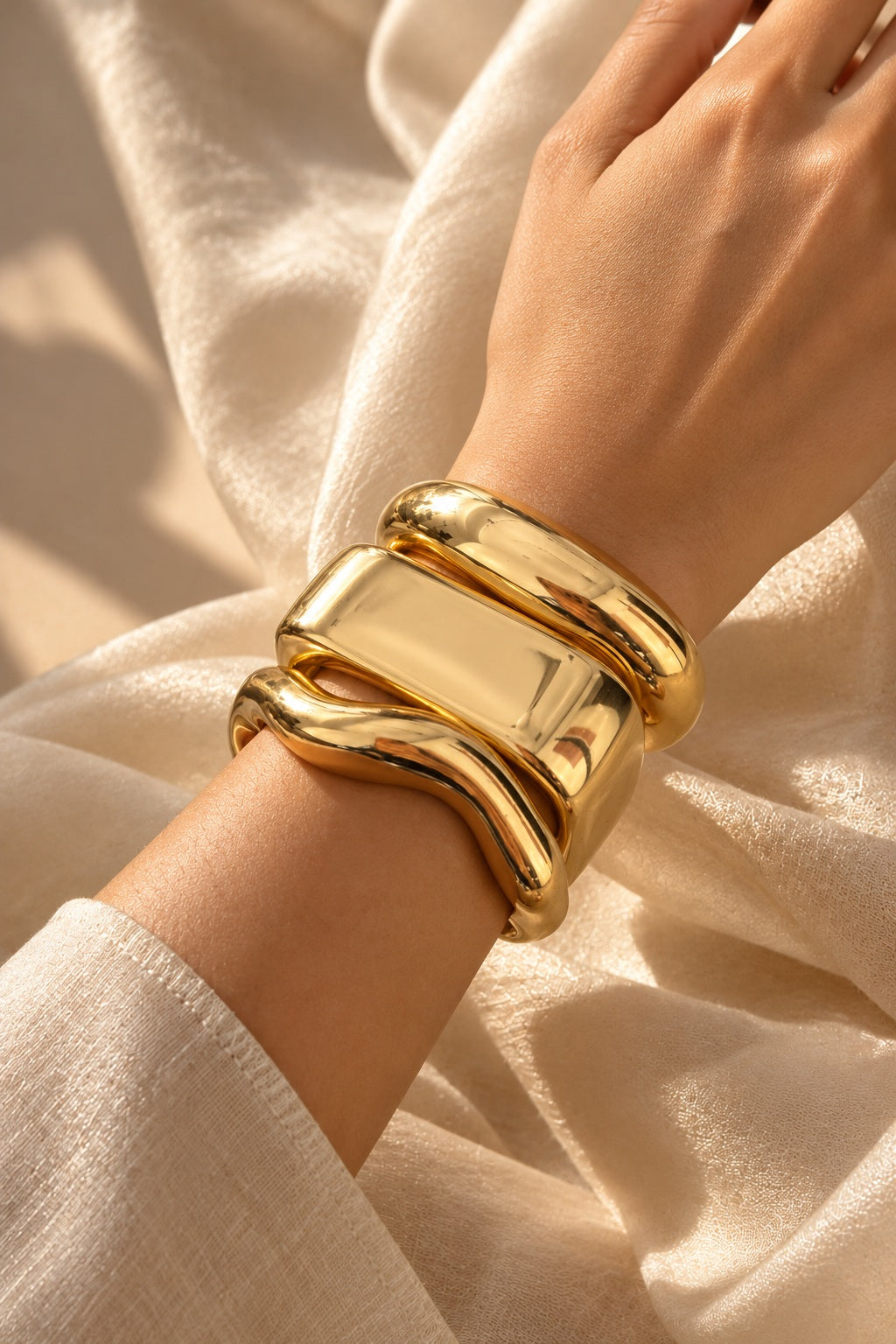 Liquid Gold Sculpt Bangles worn