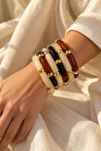 Mocha Noir Tube Bracelet Stack worn