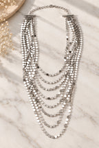 Silver Shimmer Layered Sequin Necklace flat lay