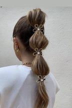 Pearl Daisy Hair Tie Set of 3 on a bubble ponytail