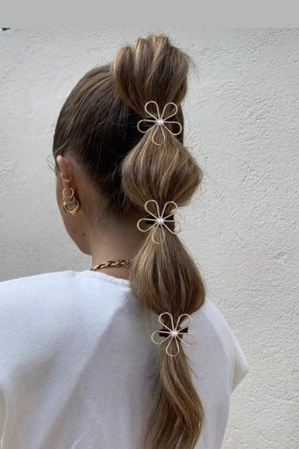 Pearl Daisy Hair Tie Set of 3 on a bubble ponytail