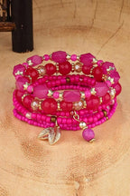 Pink Paradise Stretchable Bracelet Stack – stacked on a wooden stand