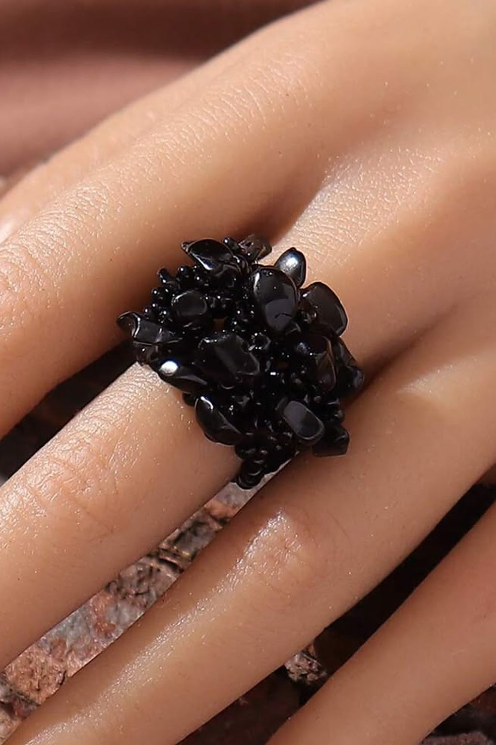Midnight Bloom Stretchable Cluster Ring worn on the finger
