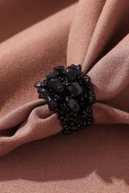 Midnight Bloom Stretchable Cluster Ring on fabric