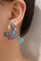 Sparkle Swallow Stud Earrings worn, side view