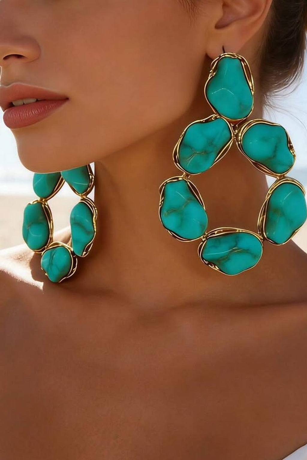 Turquoise Treasure Teardrop Hoop Earrings worn by a model
